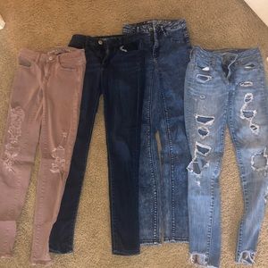 4 pairs of American Eagle jeans